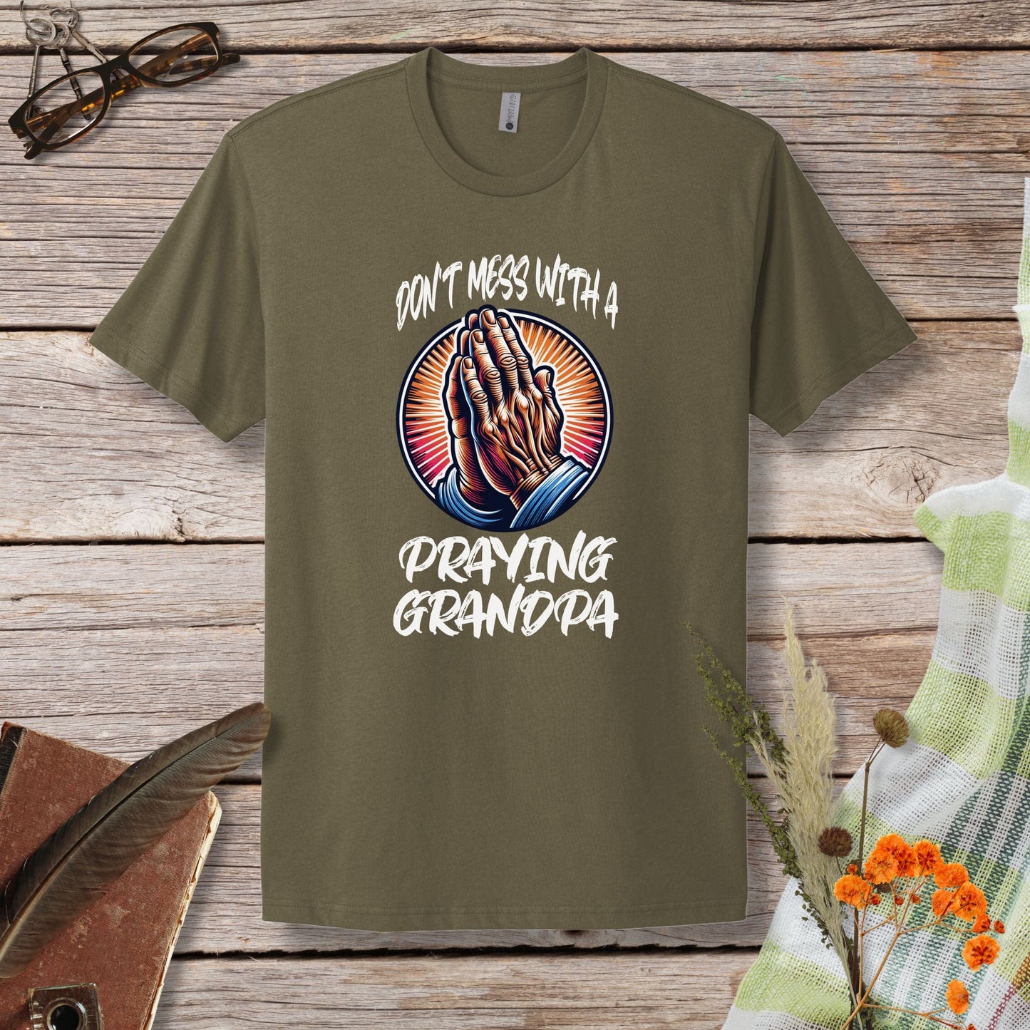 a t - shirt that says don't mess with a praying grandpa