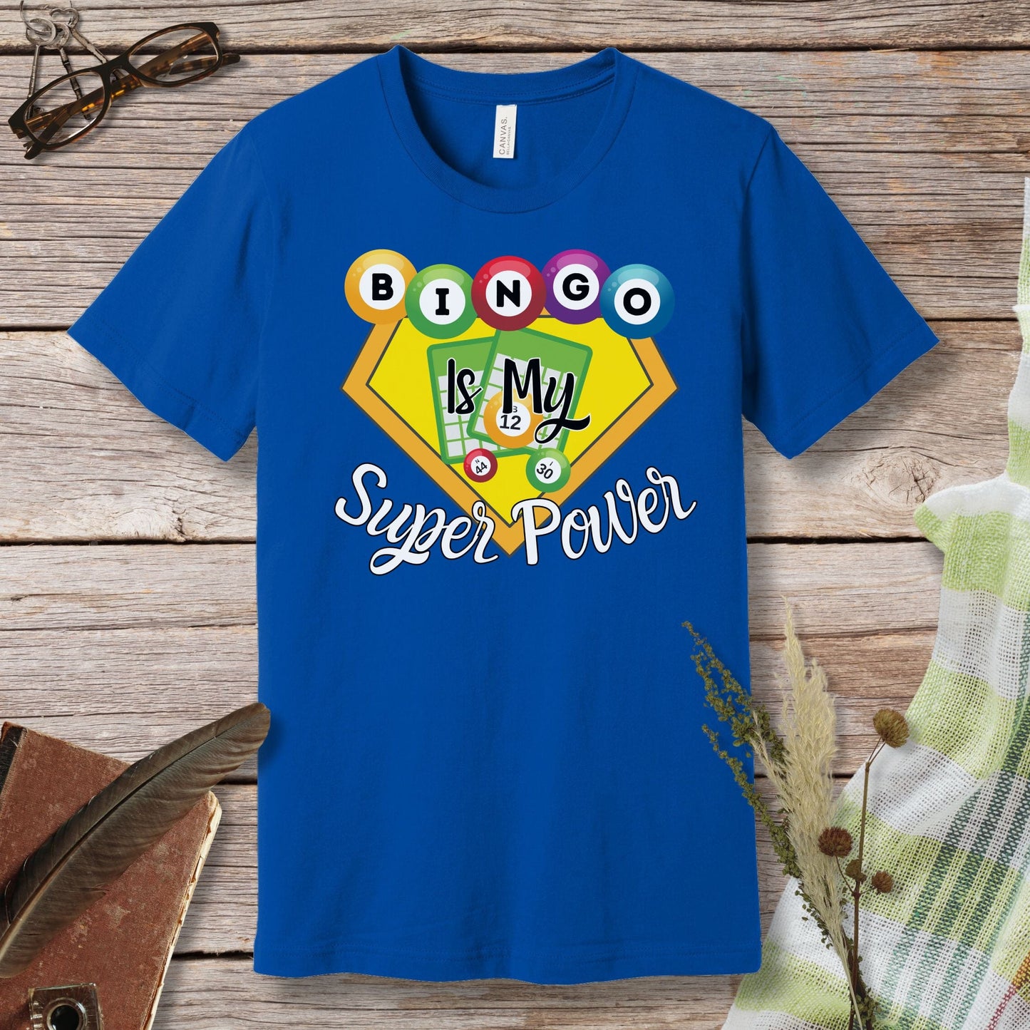 a blue t - shirt that says bingo is my super power