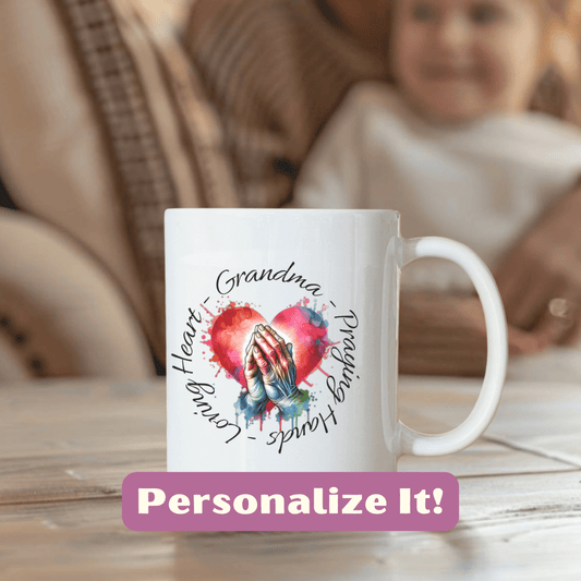 a coffee mug with a picture of a woman holding a baby