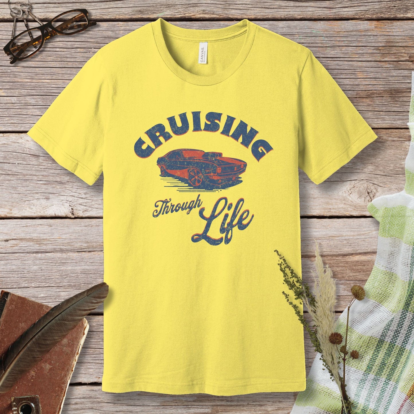 a yellow t - shirt that says cruising through life