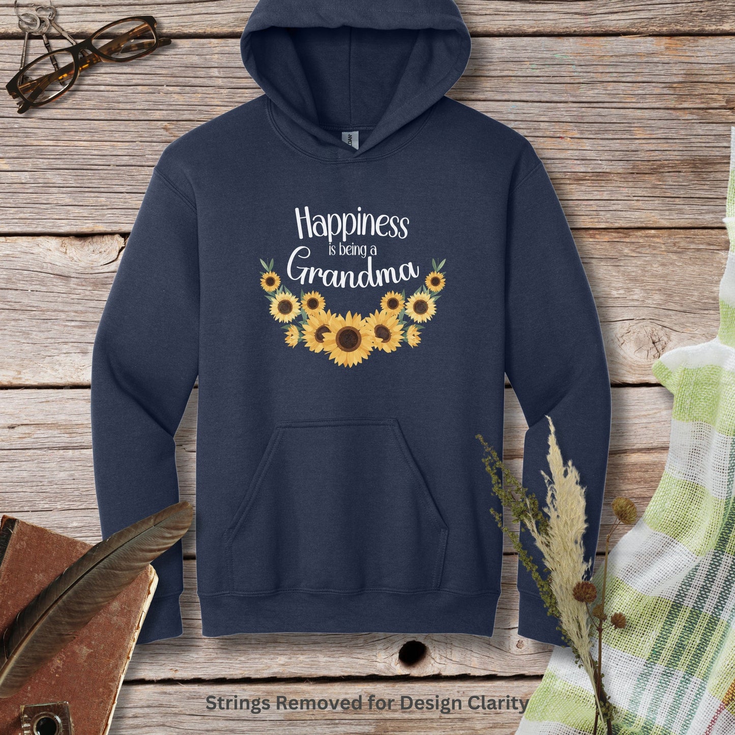 a blue hoodie with sunflowers and the words happiness is being grandma