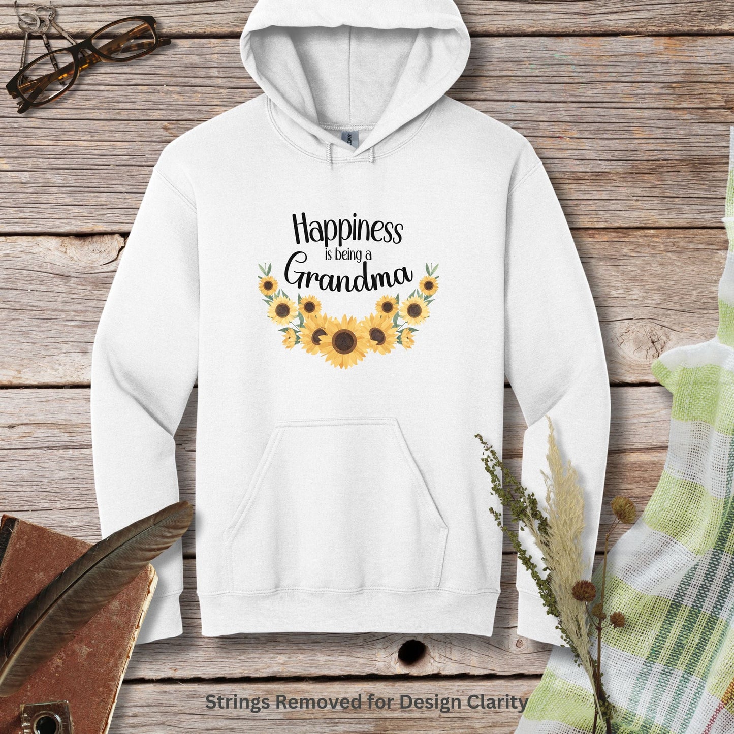 a white hoodie with sunflowers and the words happiness is being a grandma