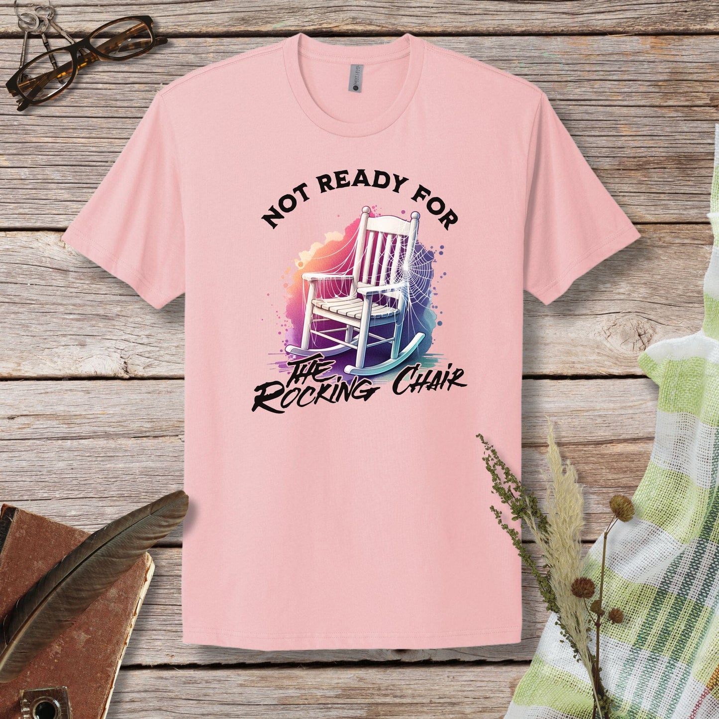 a pink t - shirt that says not ready for the rocking chair