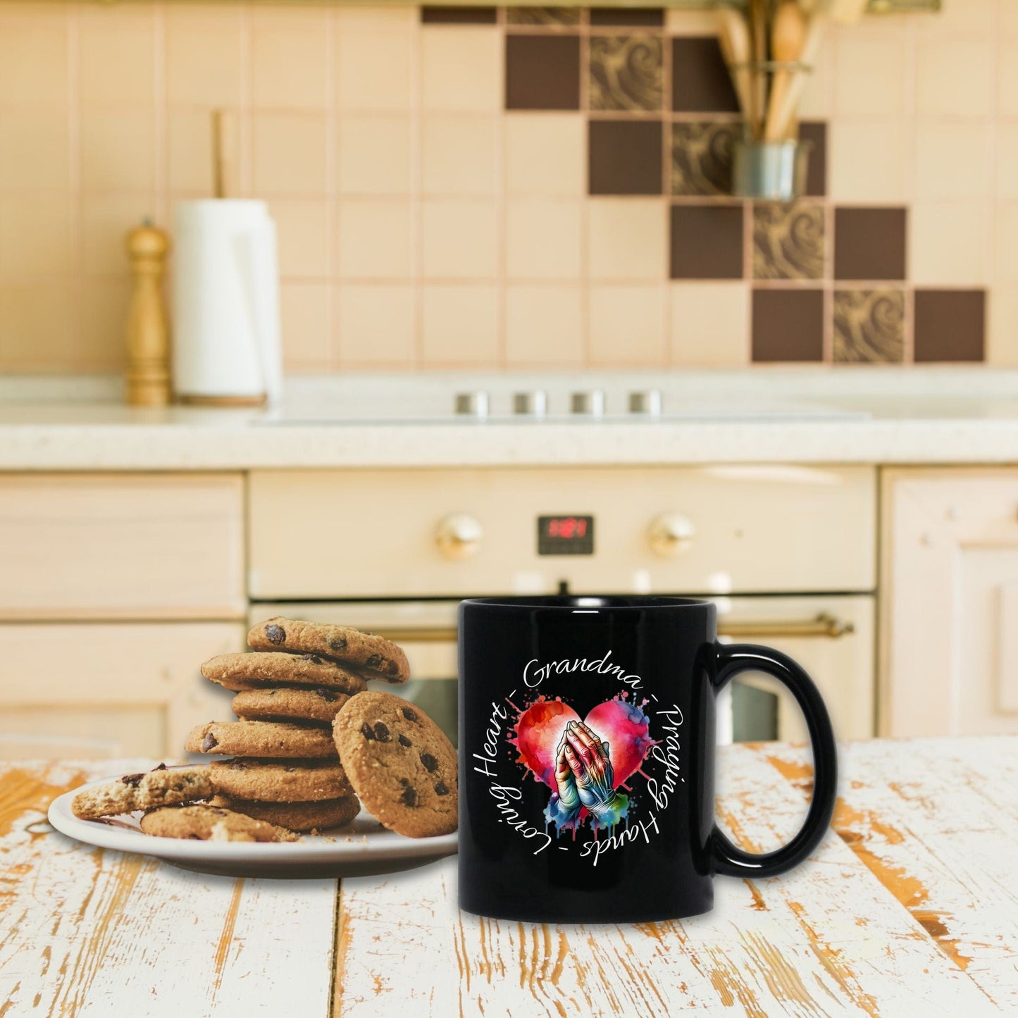 a plate of cookies and a mug on a table