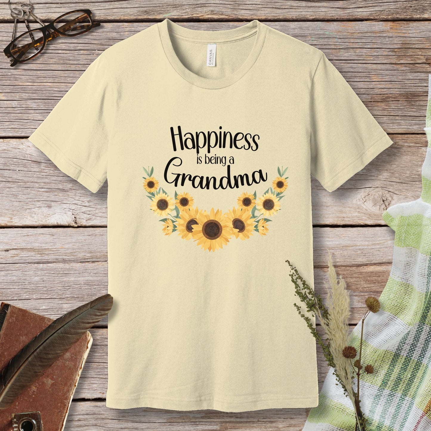 a t - shirt that says happiness is in the grandma