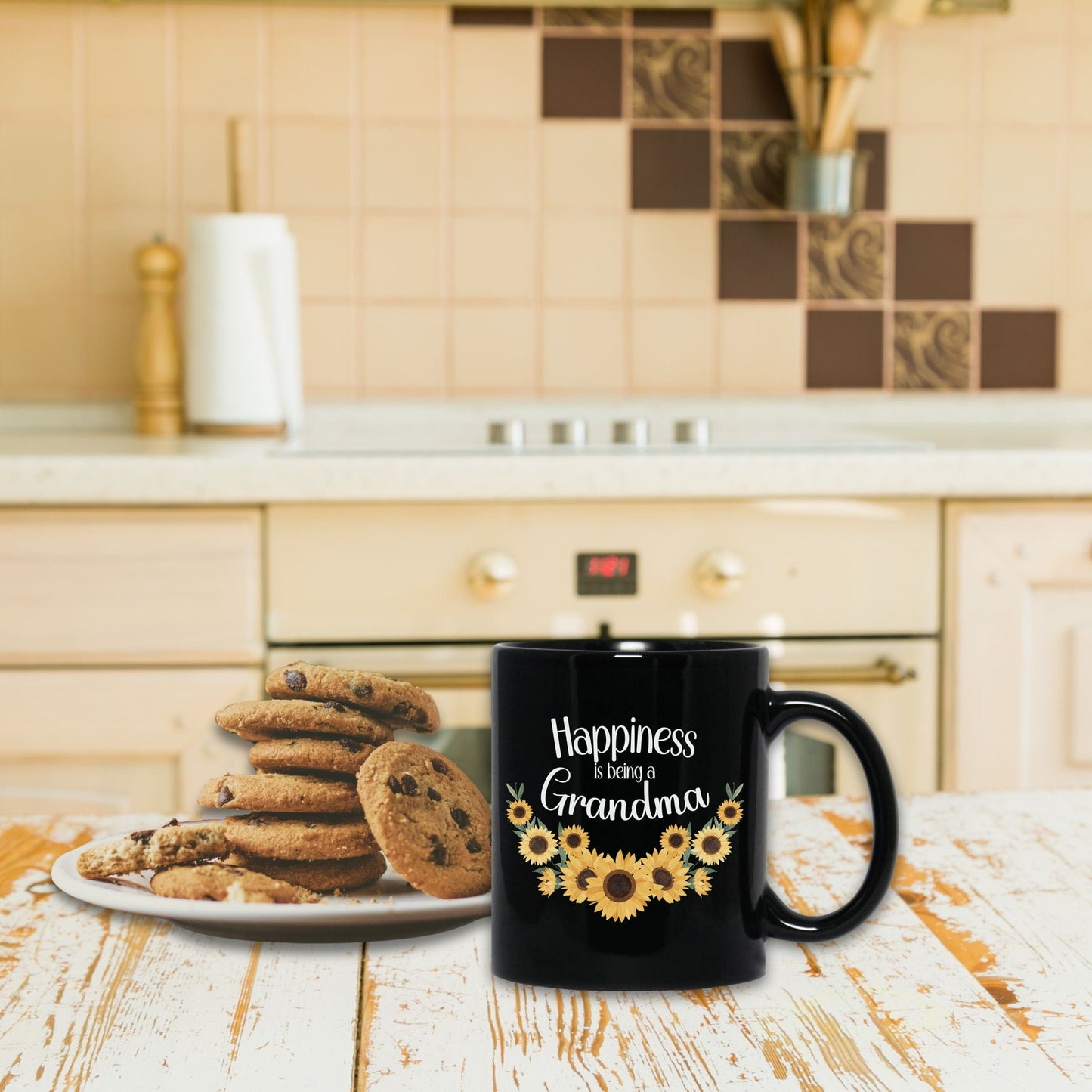 a plate of cookies and a coffee mug on a table