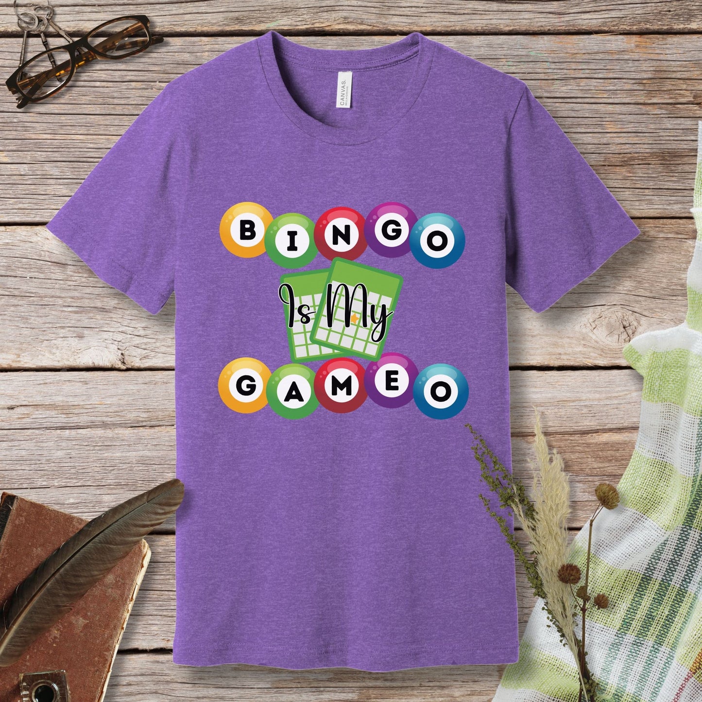 a purple t - shirt with the words bingo my game on it