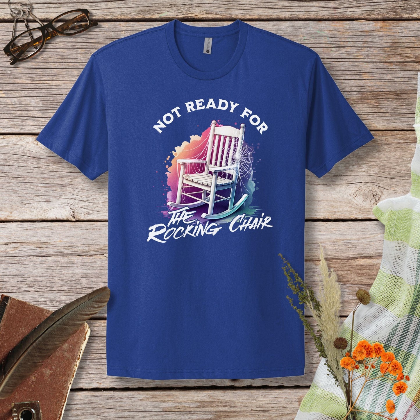 a blue t - shirt that says not ready for the rocking chair