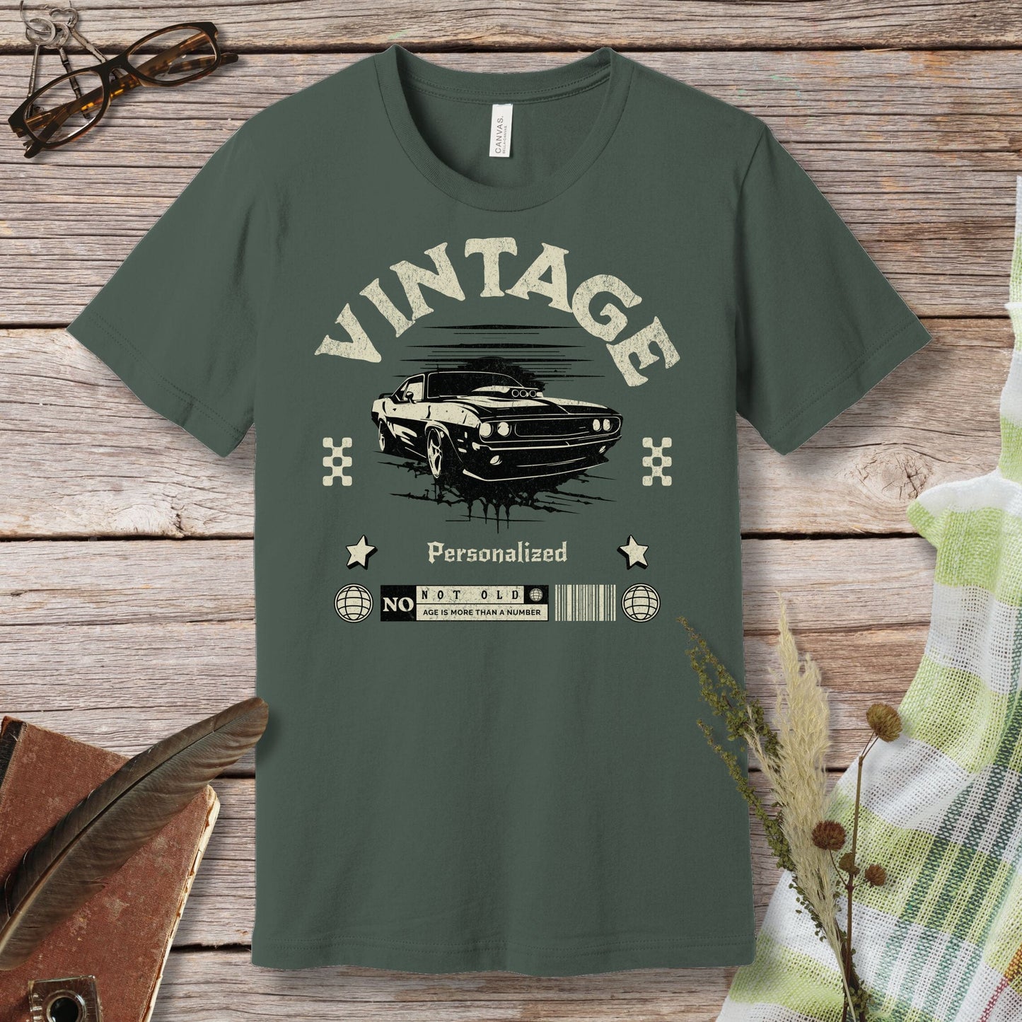 a green t - shirt with a vintage car on it