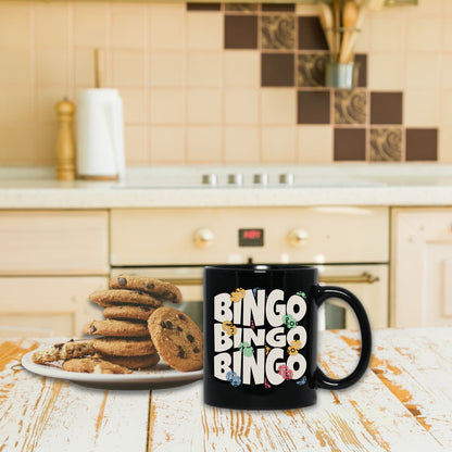 a plate of cookies and a mug on a table