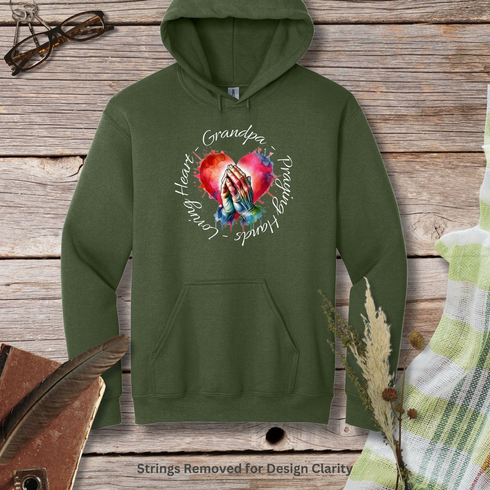 a green hoodie with a heart and two hands on it