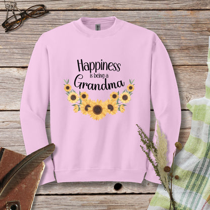 a pink sweatshirt with sunflowers and the words happiness is being a grandma