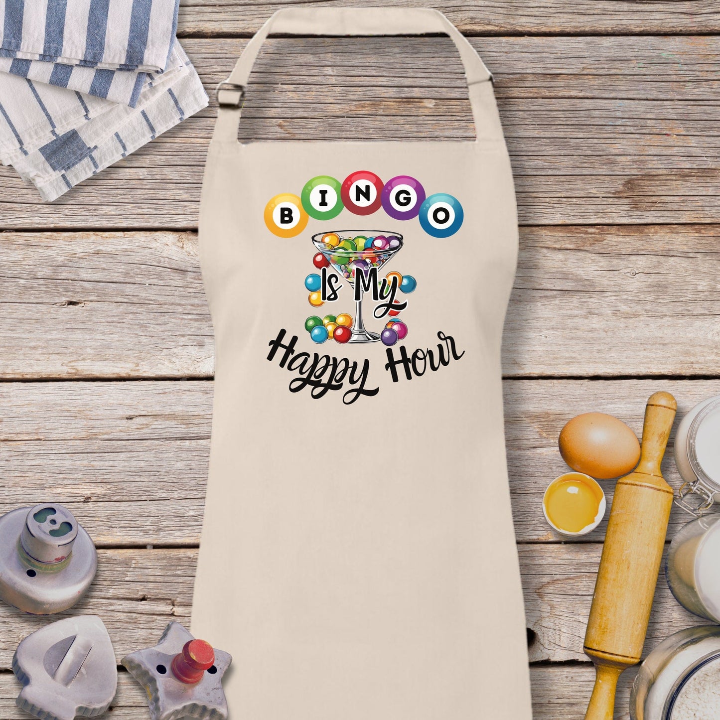 a white apron with a mickey mouse design on it