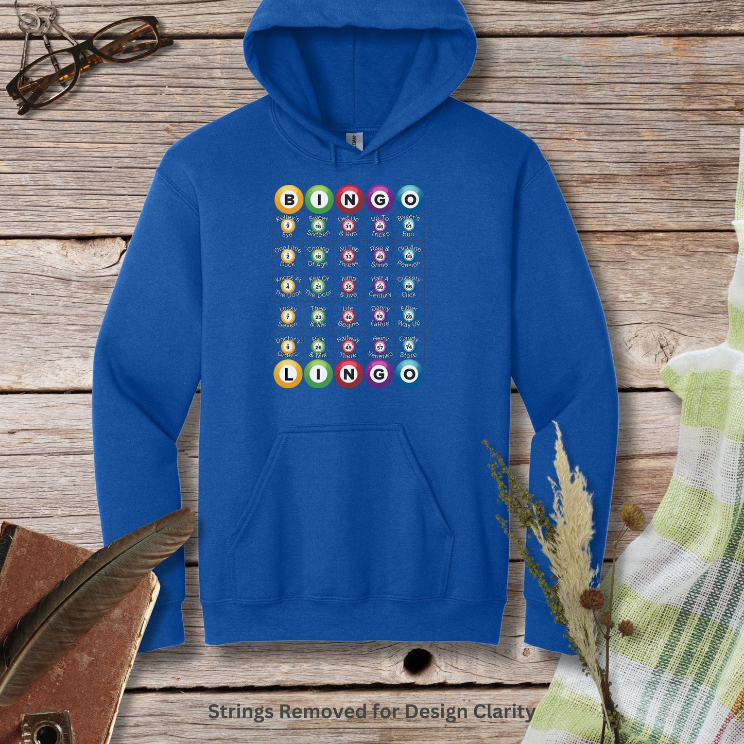 a blue hoodie with a bunch of buttons on it