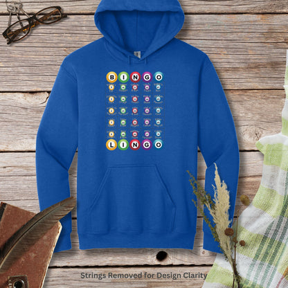 a blue hoodie with a bunch of buttons on it