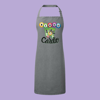 a gray apron with the words, is my cardio on it