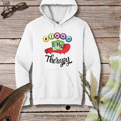 a white hoodie with the words is my therapy printed on it