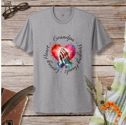 a gray t - shirt with a picture of a hand holding a heart