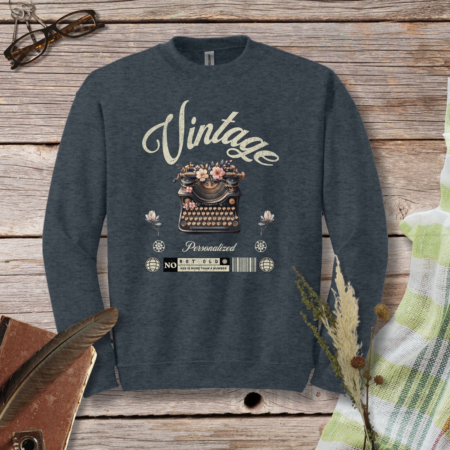 a sweatshirt with a vintage typewriter on it