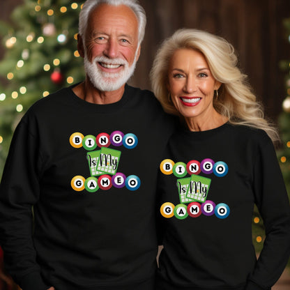 a man and a woman wearing matching black sweaters