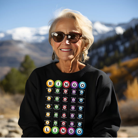 a woman wearing a black shirt with a bunch of buttons on it