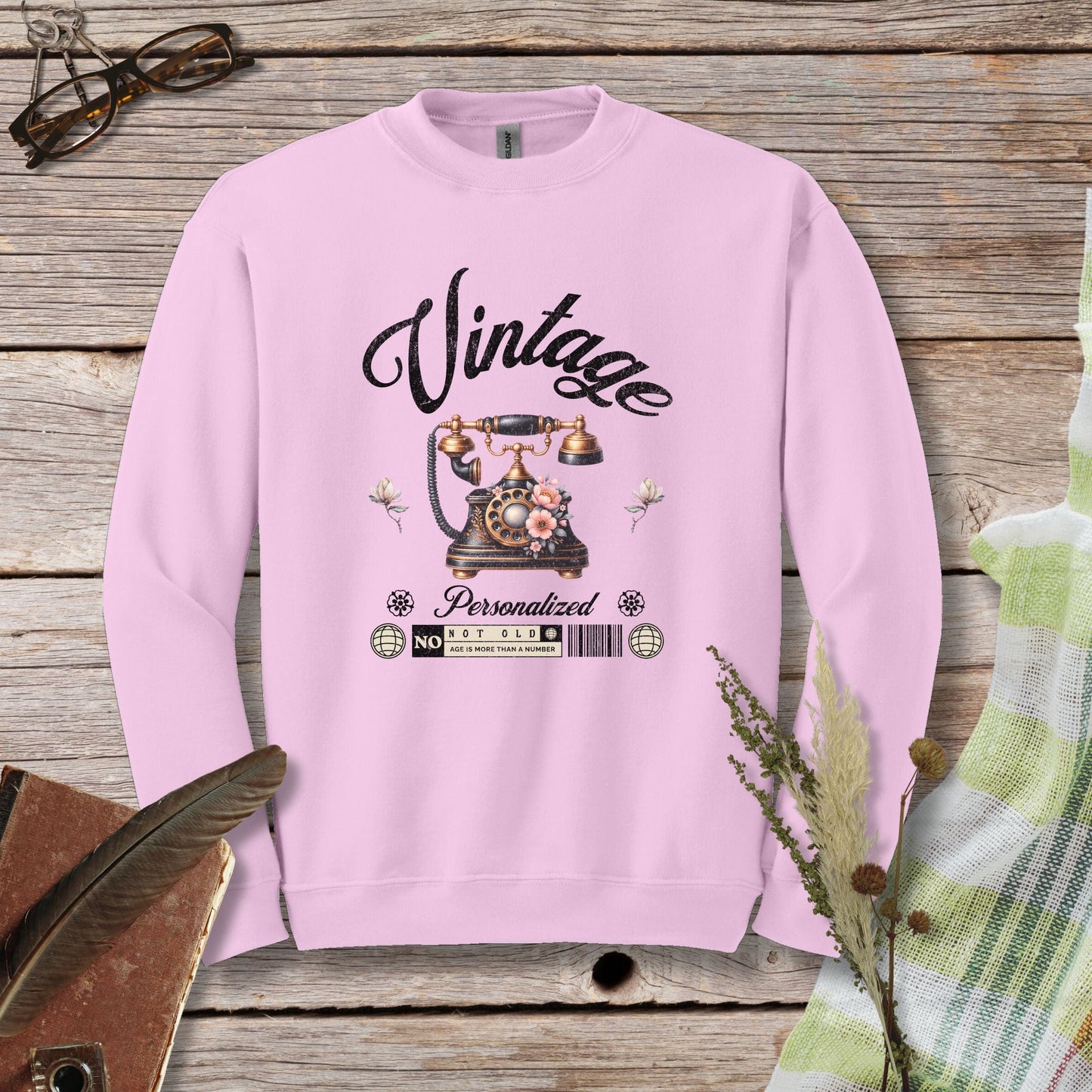 a pink sweatshirt with the words vintage on it