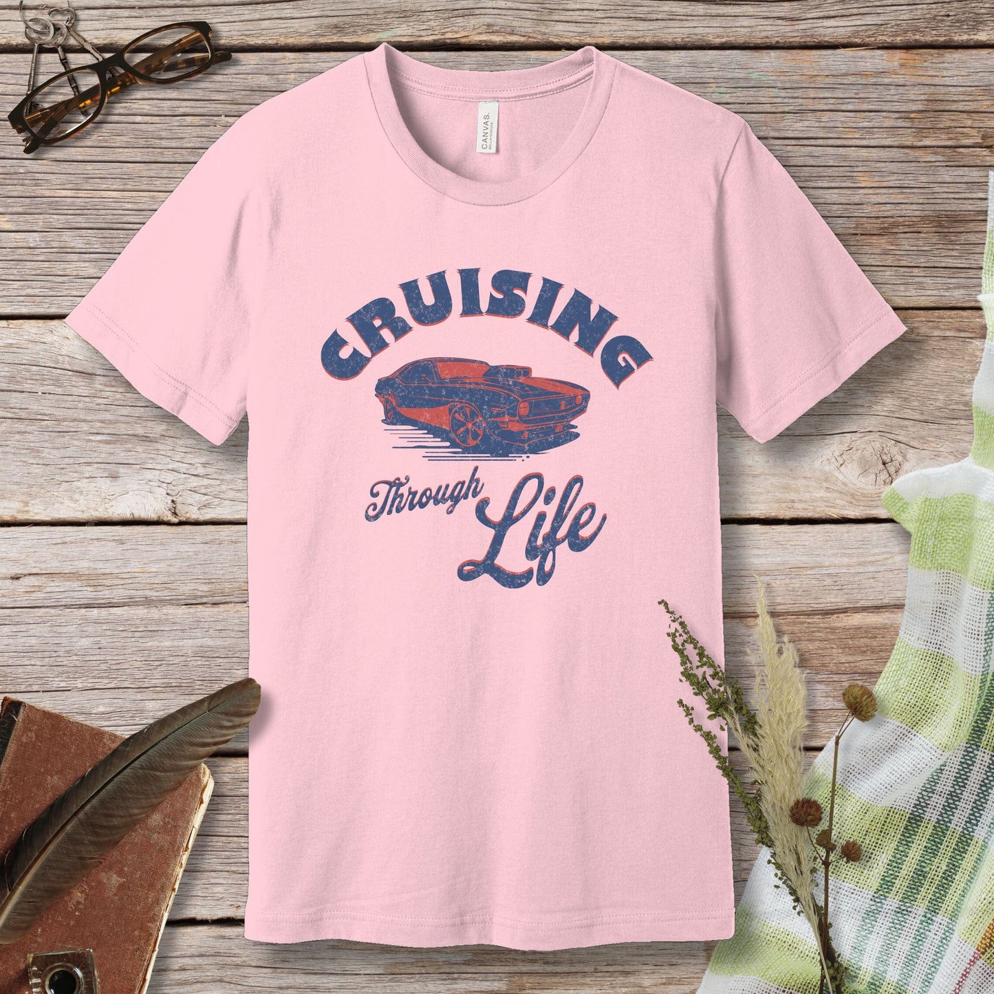 a pink shirt that says cruising through life