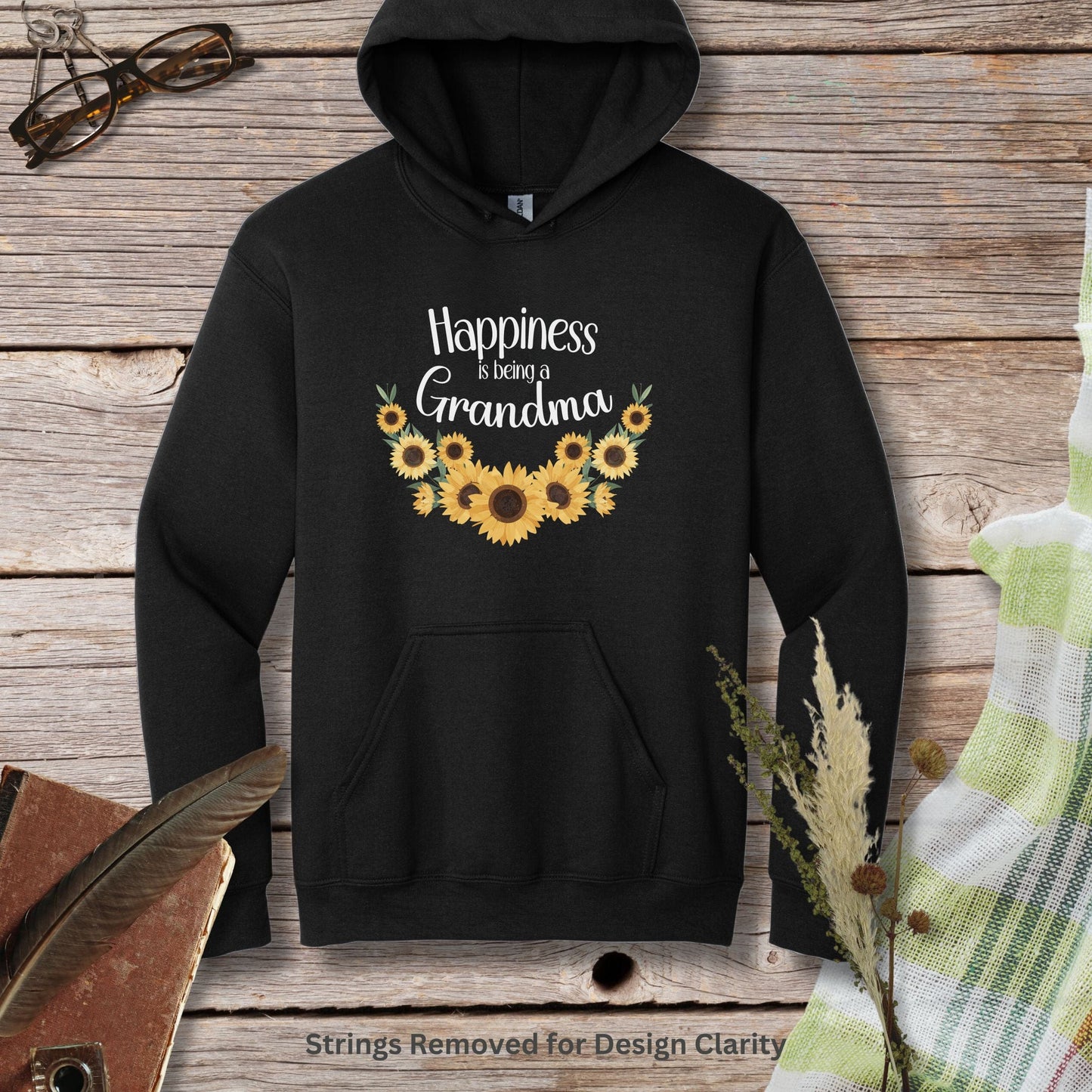 a black hoodie with sunflowers on it