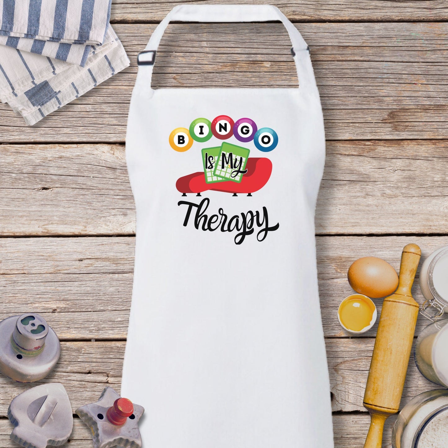 a white apron with the words boo boo therapy on it