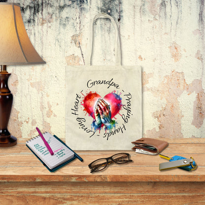 a canvas bag with a picture of a hand holding a heart