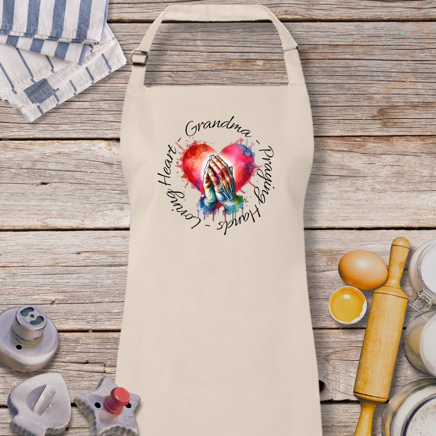 an apron with a picture of two hands holding each other