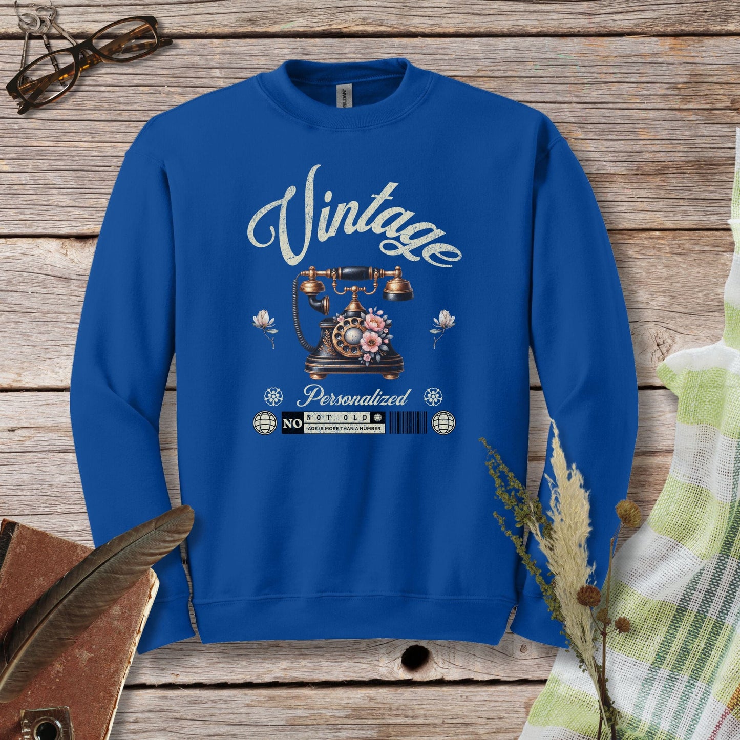 a blue sweatshirt with the words vintage on it