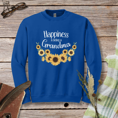 a blue sweatshirt with sunflowers and the words happiness is being a grandma