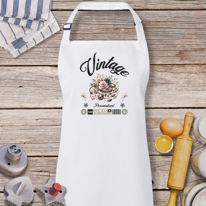 a white apron sitting on top of a wooden table