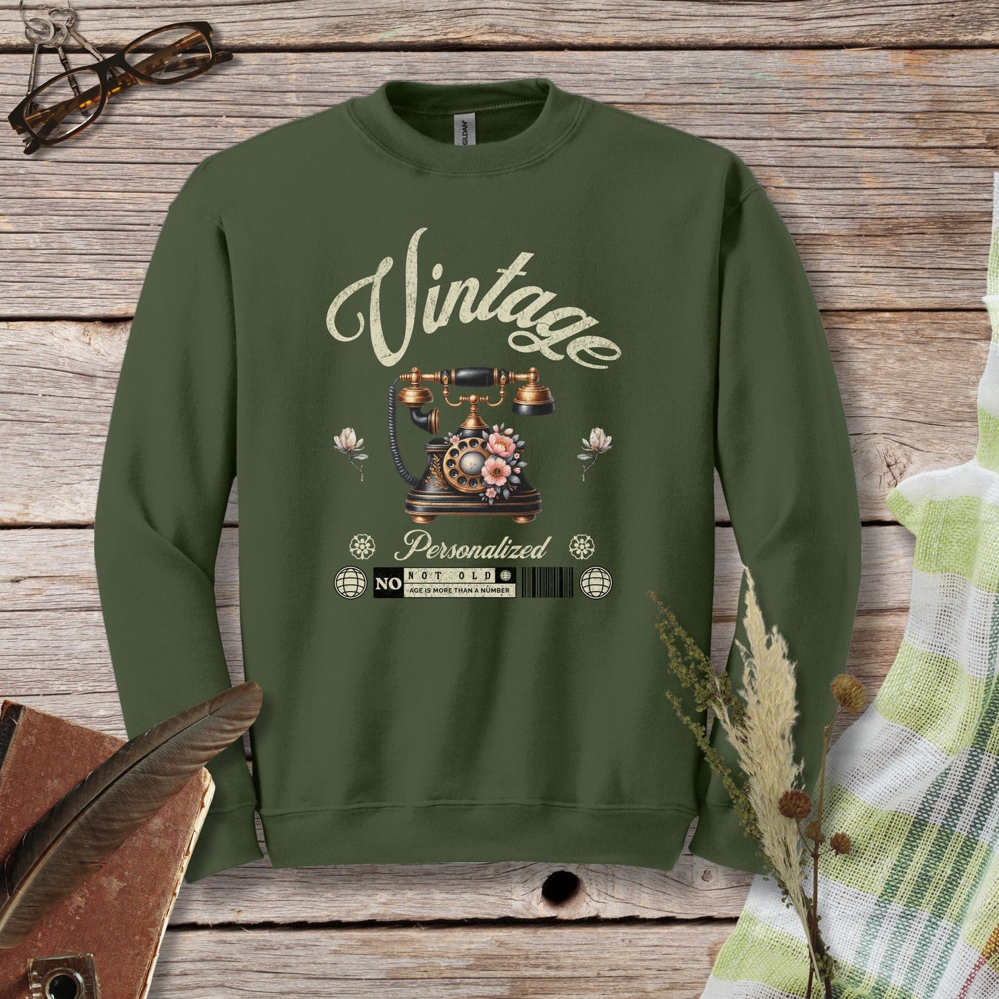 a green sweatshirt with the words vintage on it