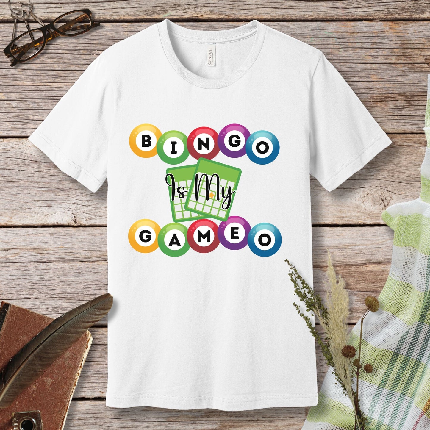 a white t - shirt with a game design on it