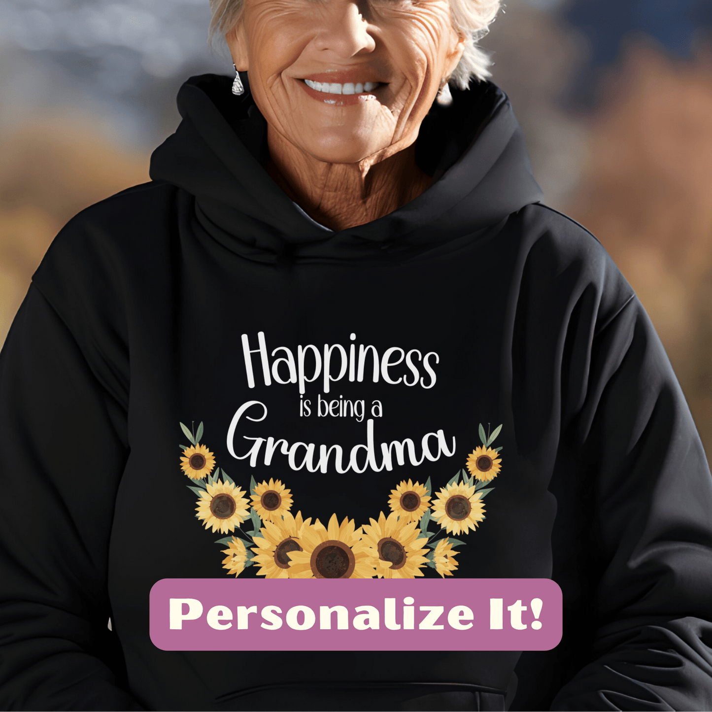 a woman wearing a black hoodie that says happiness is being a grandma