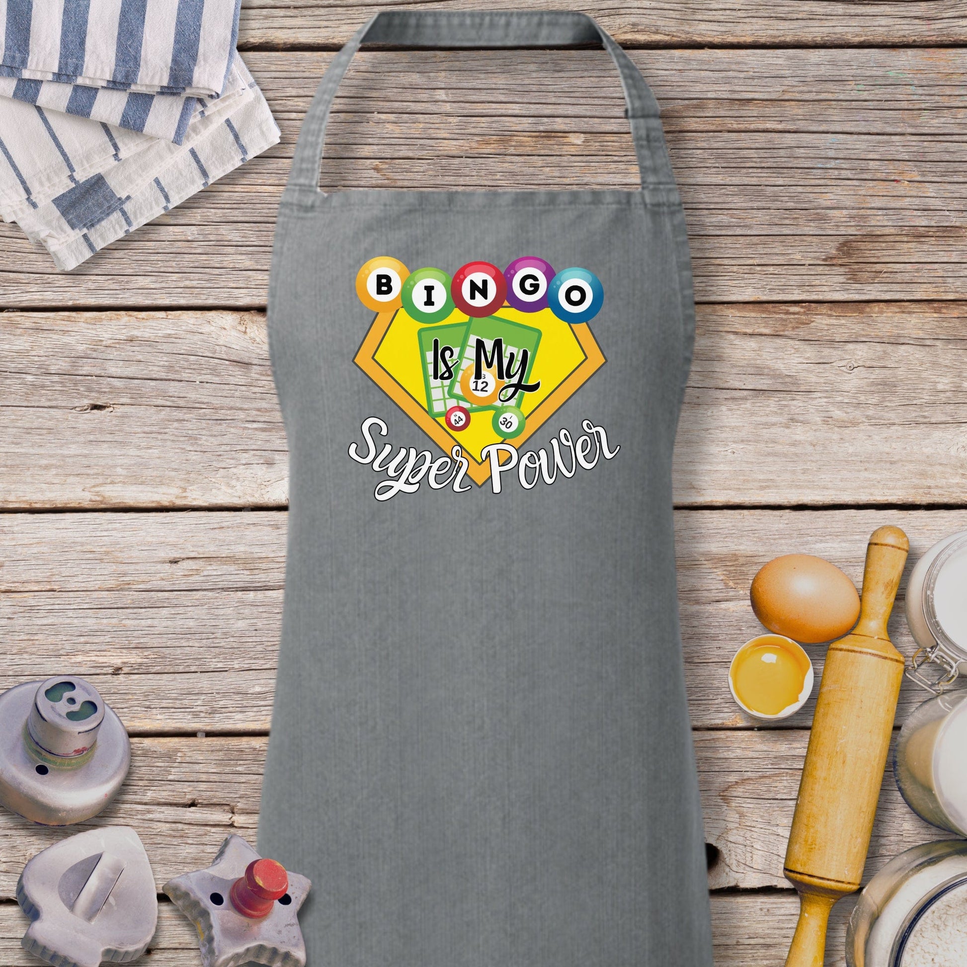 a gray apron with a picture of a super hero on it