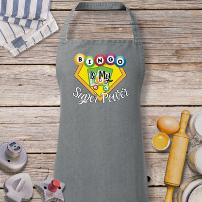 a gray apron with a picture of a super hero on it