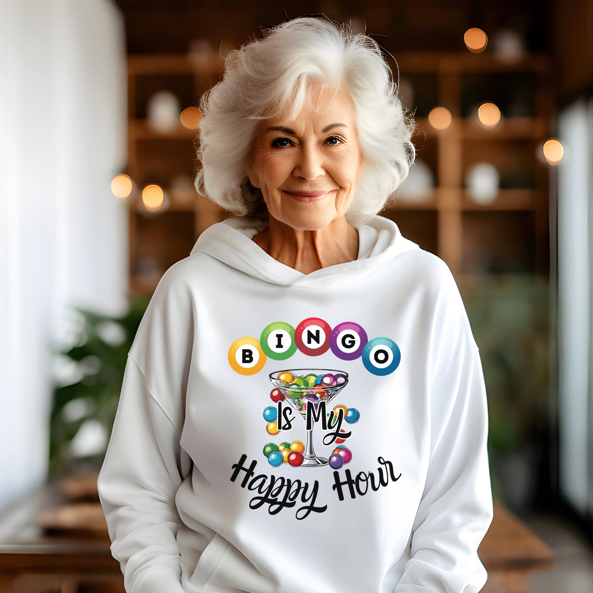 an older woman wearing a white hoodie that says bingo is my happy hour