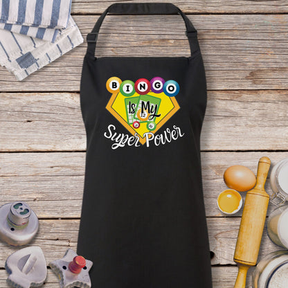 a black apron with the words boo boo super power on it