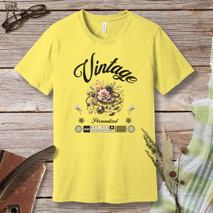 a yellow vintage t - shirt sitting on top of a wooden table