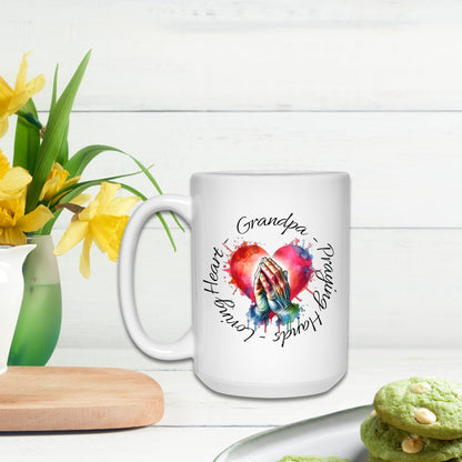 a white coffee mug with a picture of a hand holding a heart surrounded by flowers