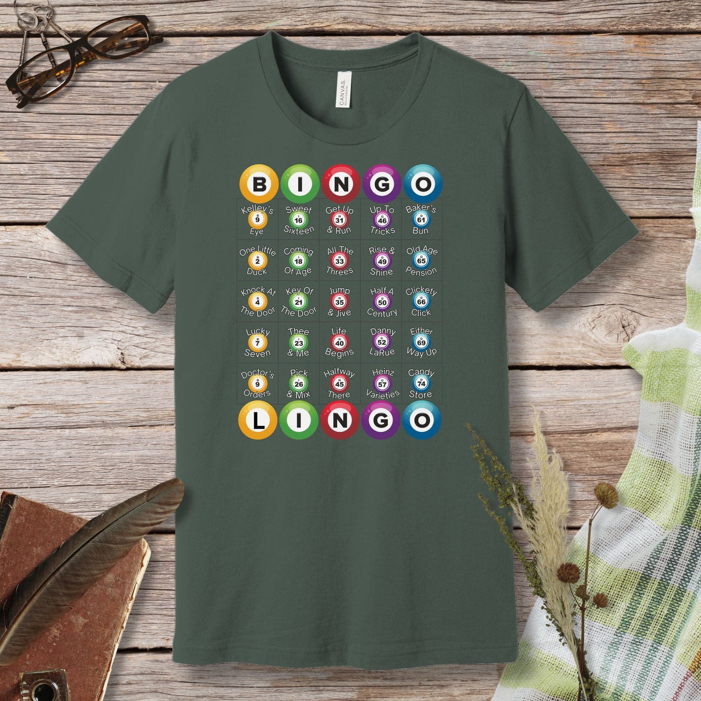 a green t - shirt with a bunch of buttons on it