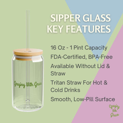 a glass jar with a straw in it