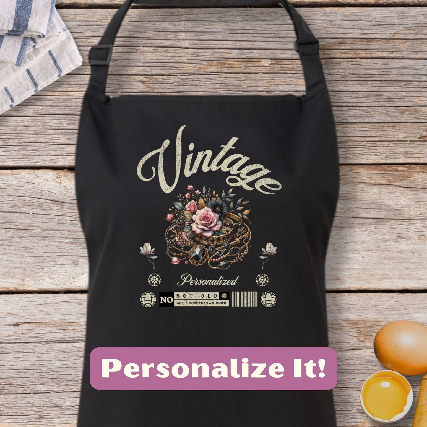 a black apron with the words vintage personalize it