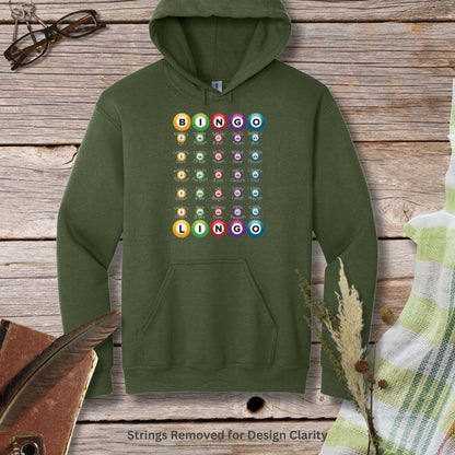 a green hoodie that has a bunch of buttons on it