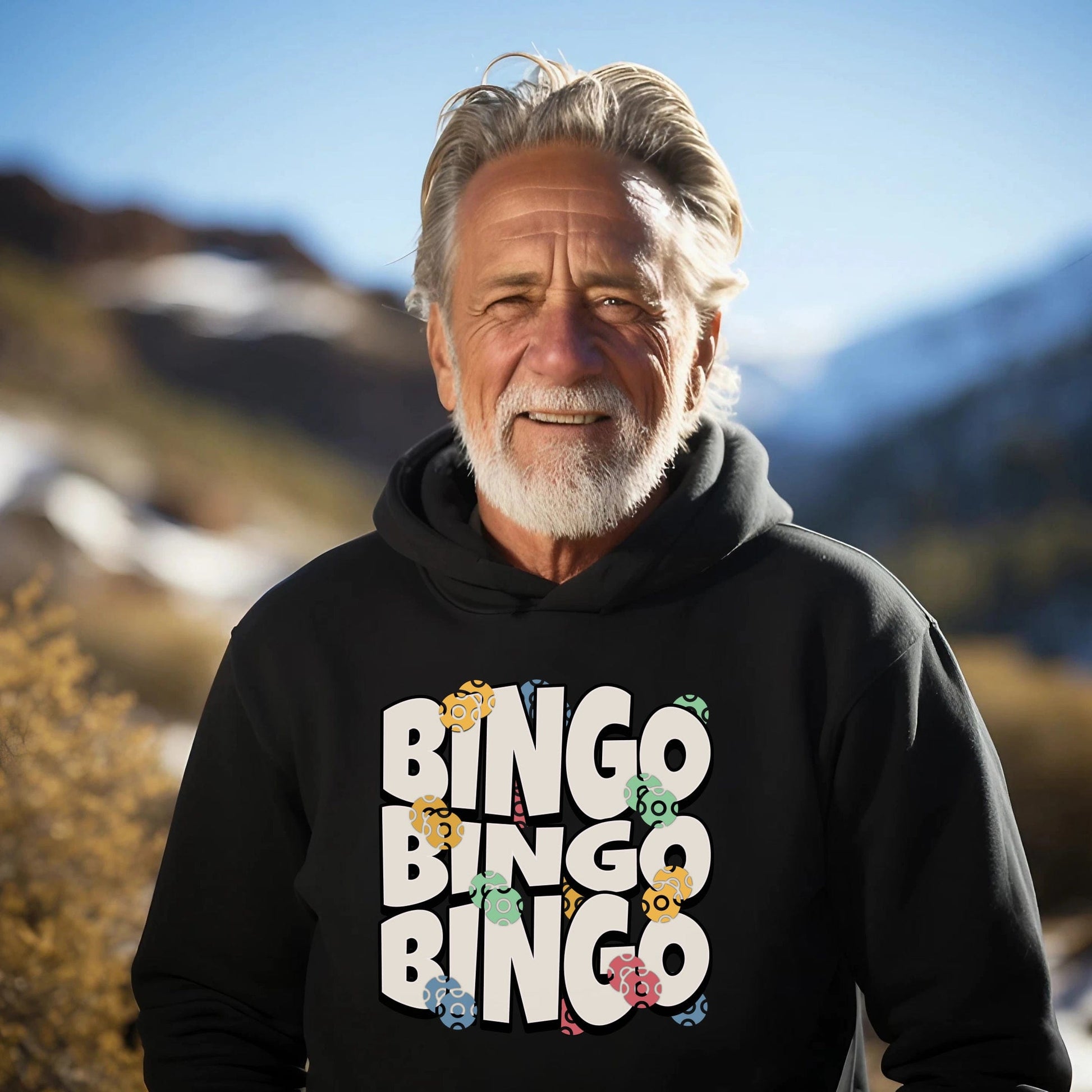 a man wearing a black hoodie with the words bingo bingo on it