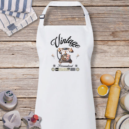 a white apron sitting on top of a wooden table