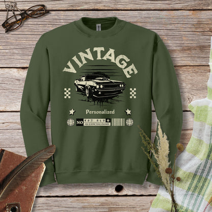 a green sweatshirt with a picture of a car on it